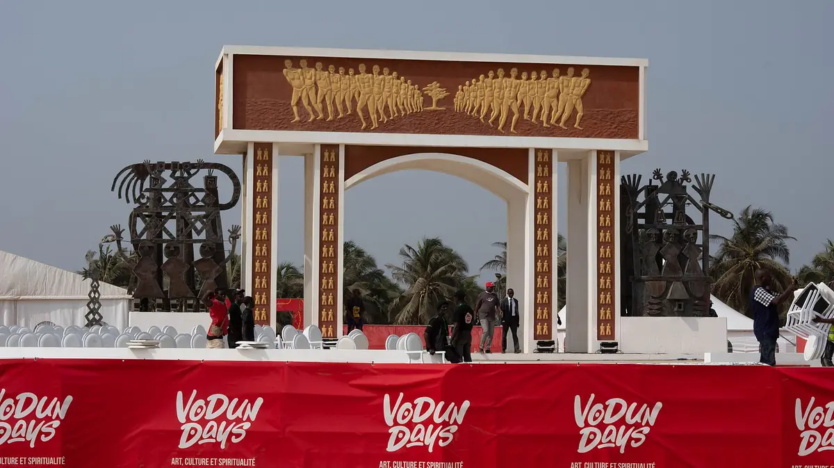 The Door of No Return in Ouidah and its two sculptures, during the preparation of Vodun Days